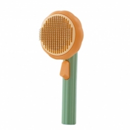 Brush cleans wool Пуходерка с кнопкой круглая Оранжево-зеленая 19*8*7 см - Инструменты для груминга собак
